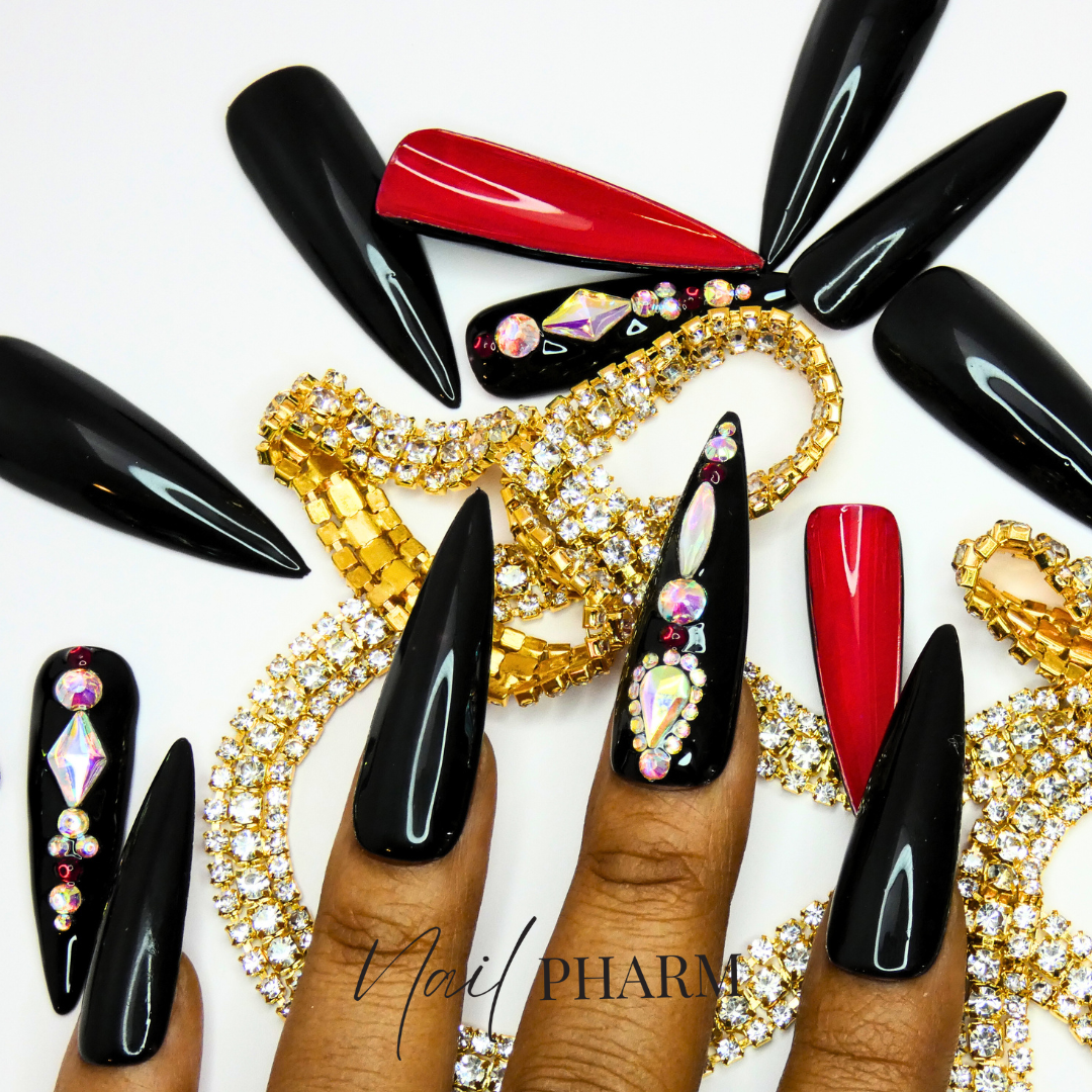 red and gold stiletto nails